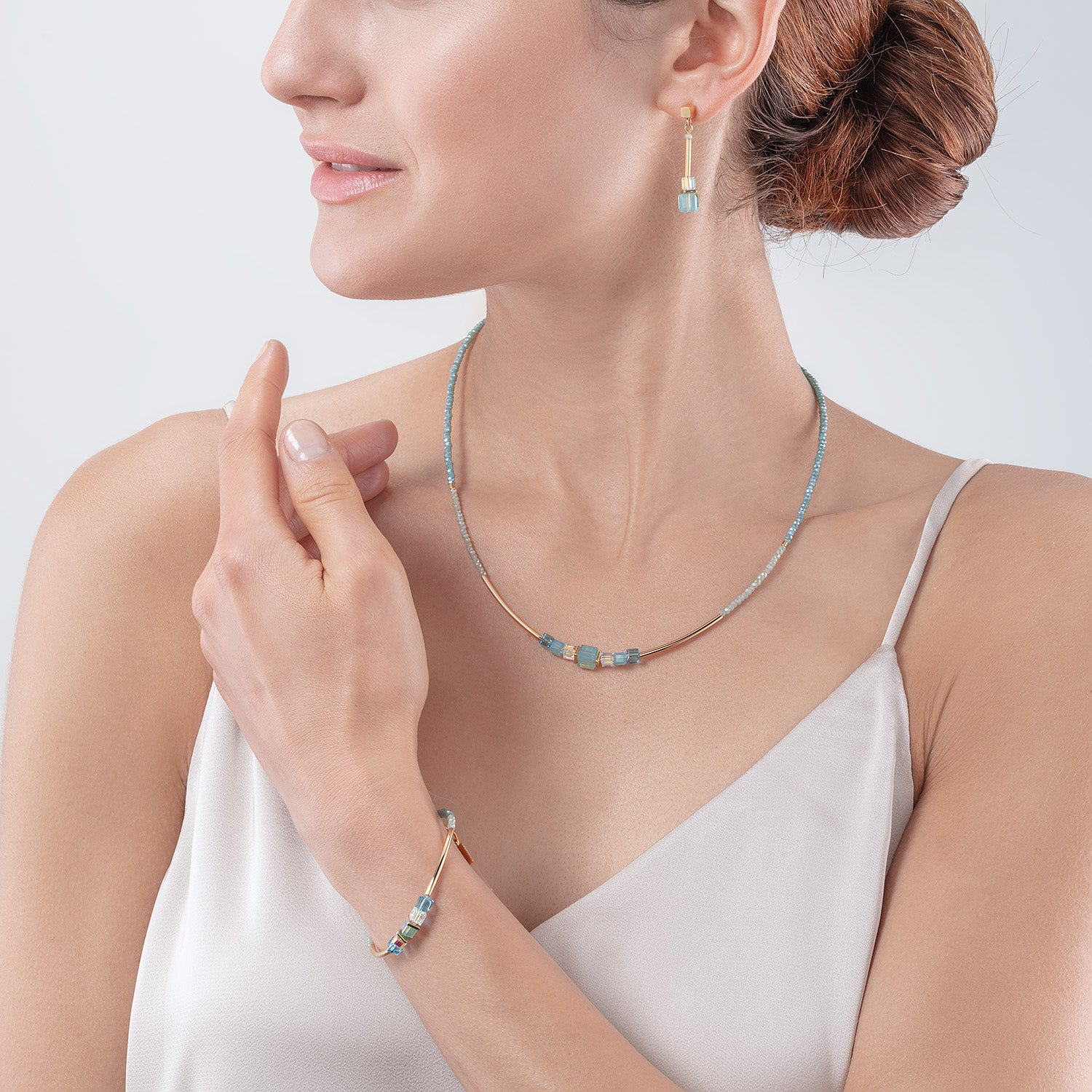 Cube Story Minimalistic bracelet gold-turquoise